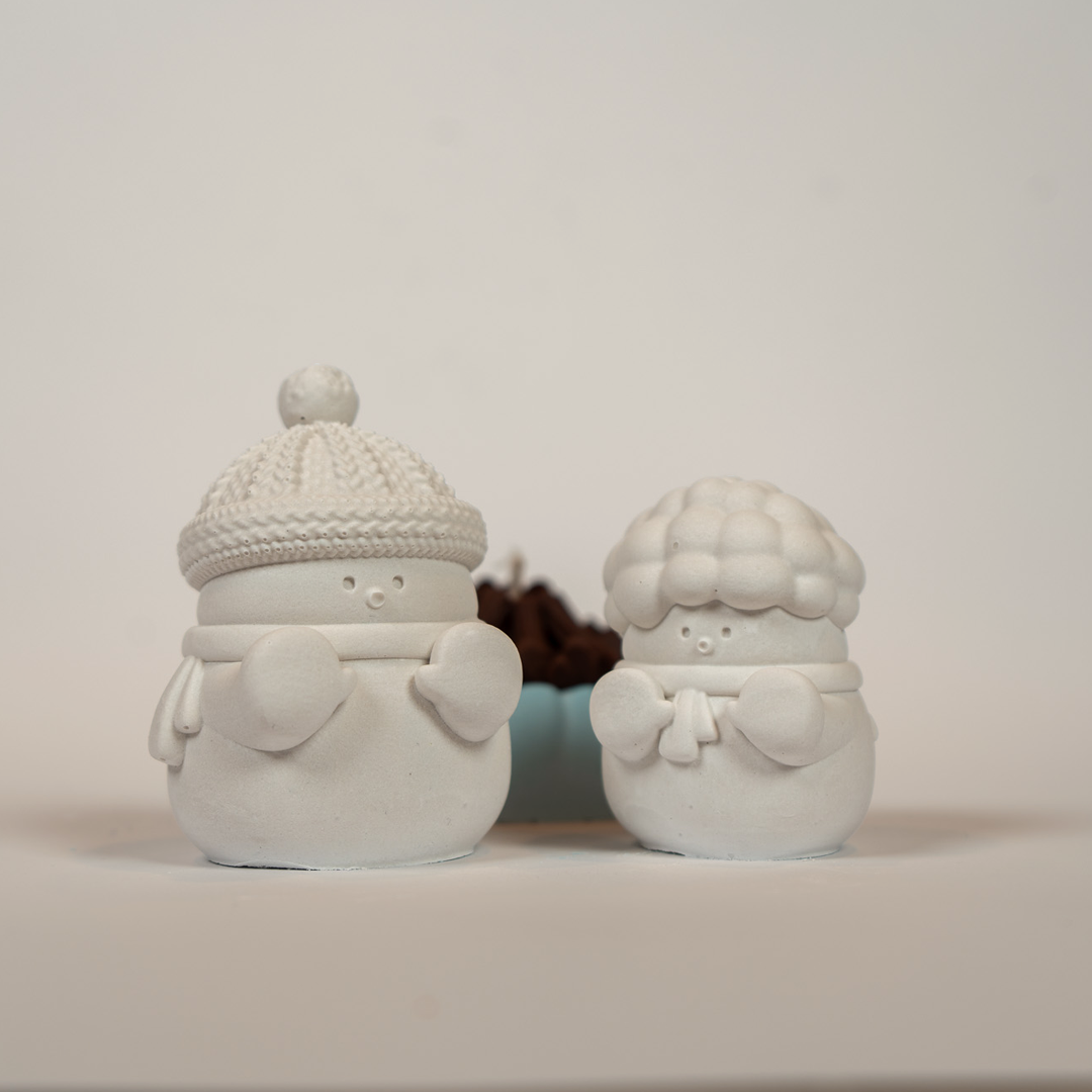 Handwärmer-Kerze mit Figuren
