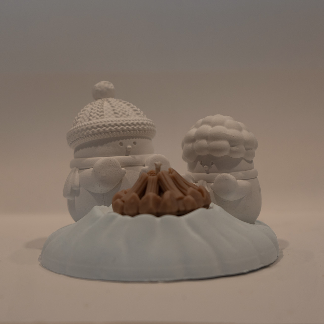 Handwärmer-Kerze mit Figuren