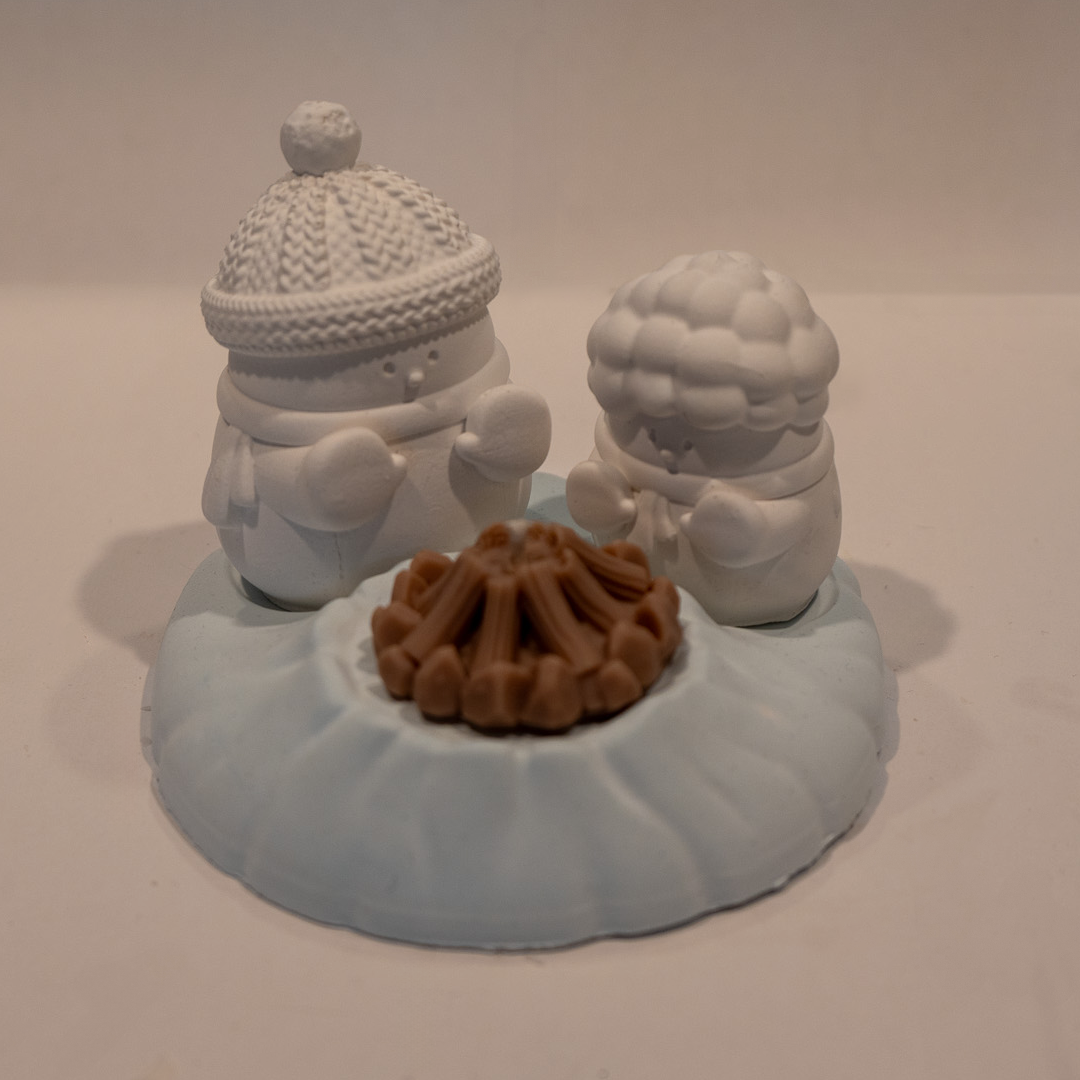 Handwärmer-Kerze mit Figuren