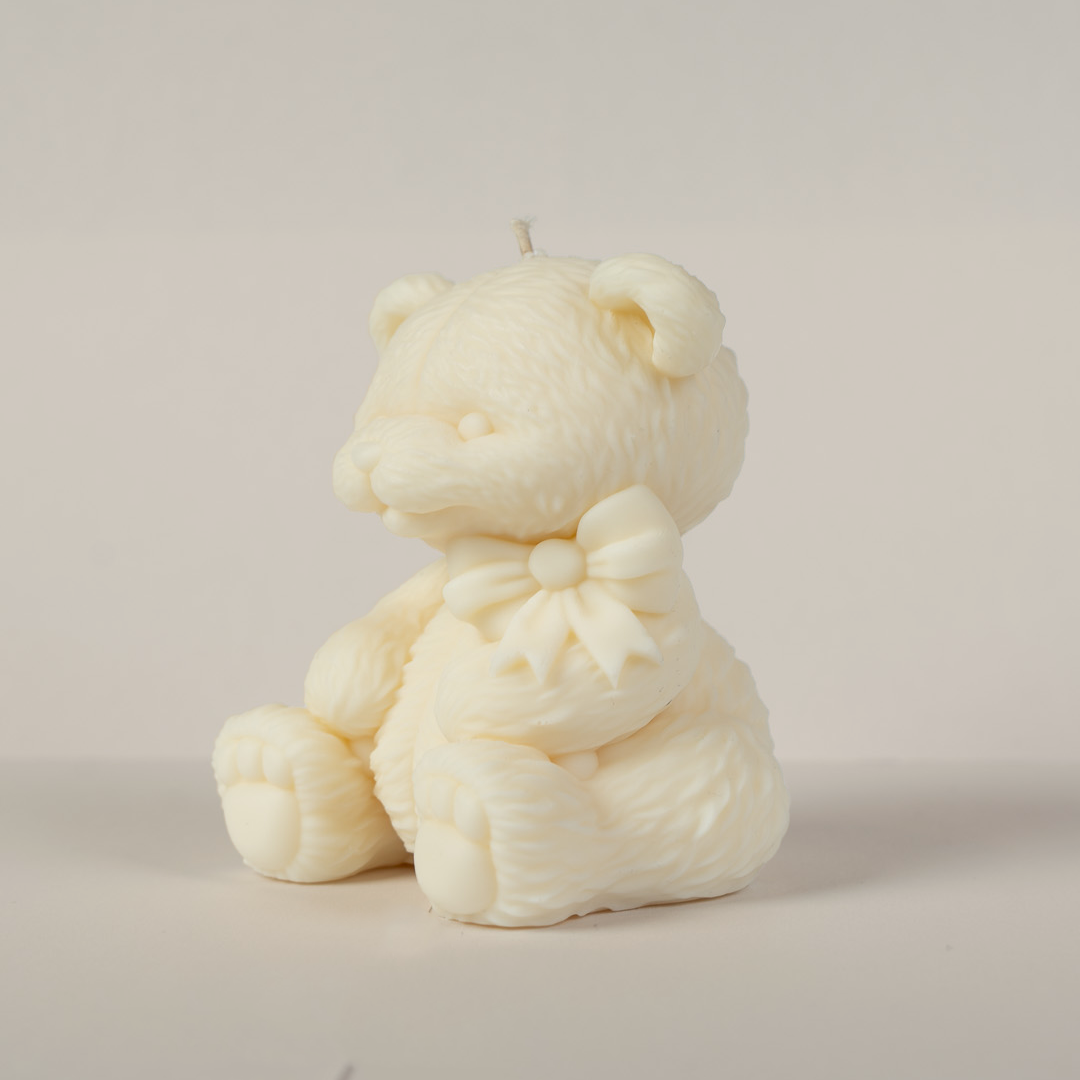 Teddy mit Schleife-Kerze